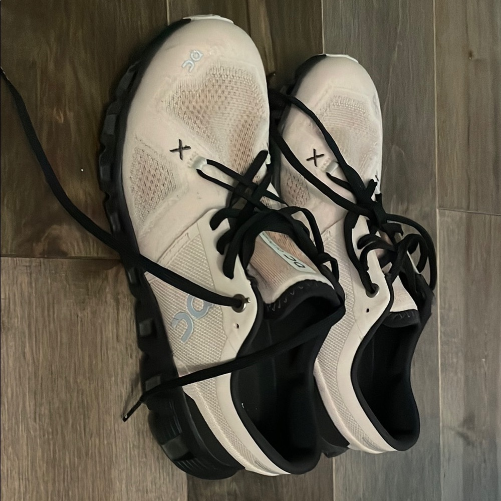 On Running Athletic Shoes in White and Black